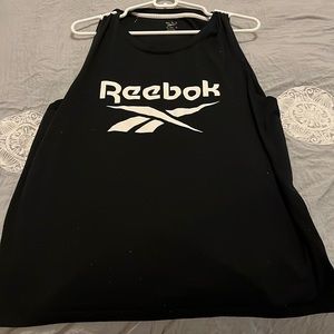 Woman’s hardly worn Reebok tank